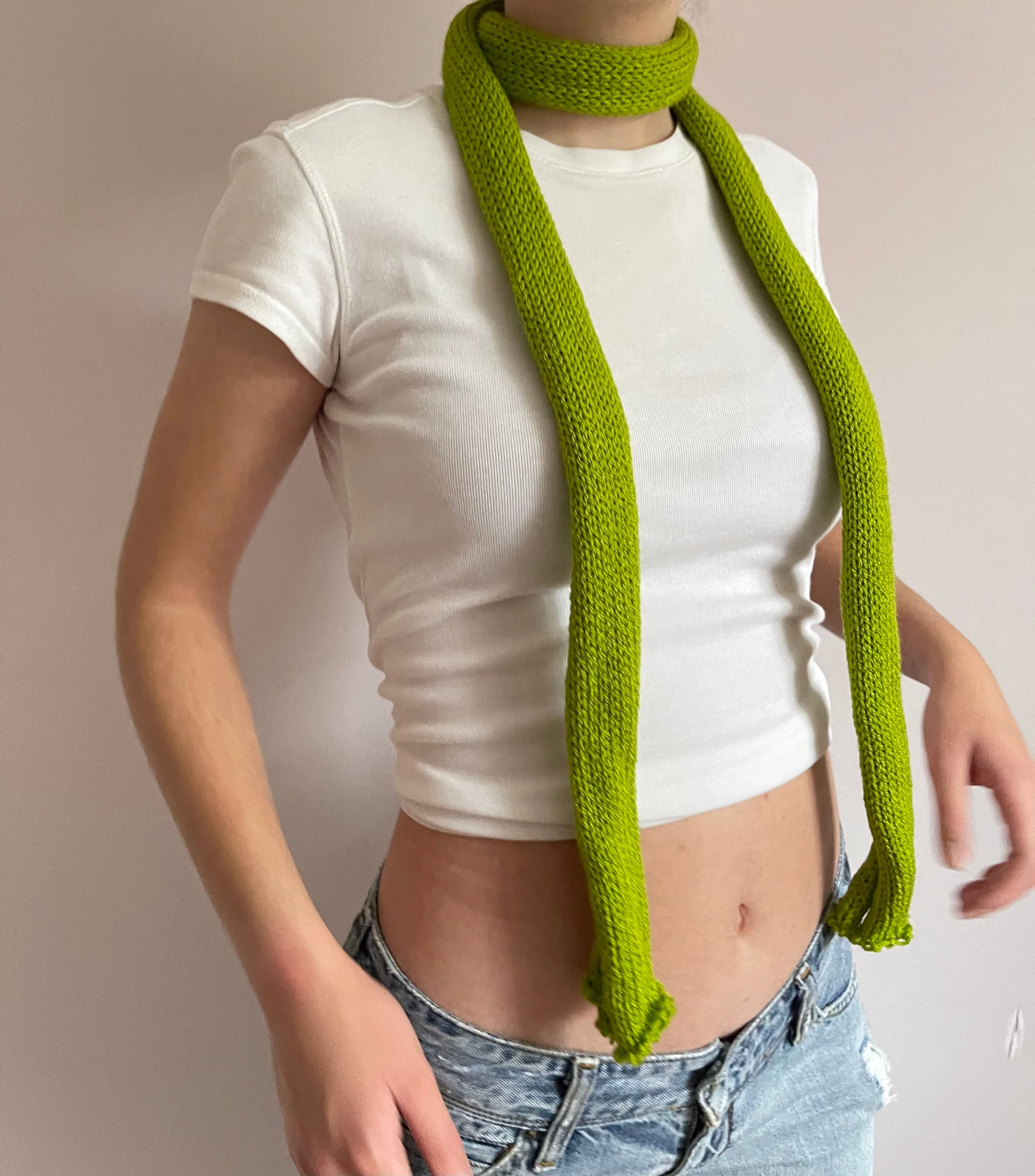 Handmade knitted skinny scarf in olive green