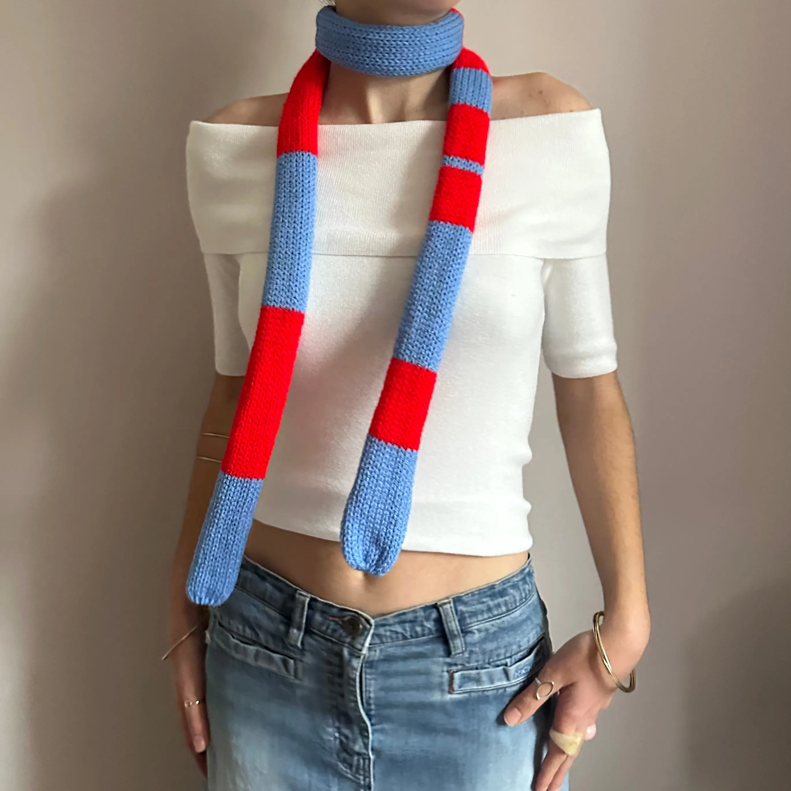 Handmade knitted stripy skinny scarf in red and blue